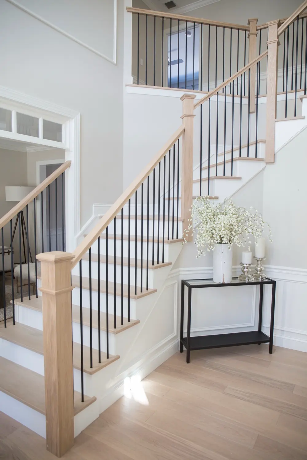 Natural white oak box newels and satin-black iron Snyder Stairs built in Whitehall
